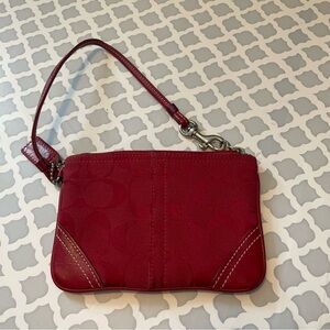 Red Coach wristlet. Gently used.